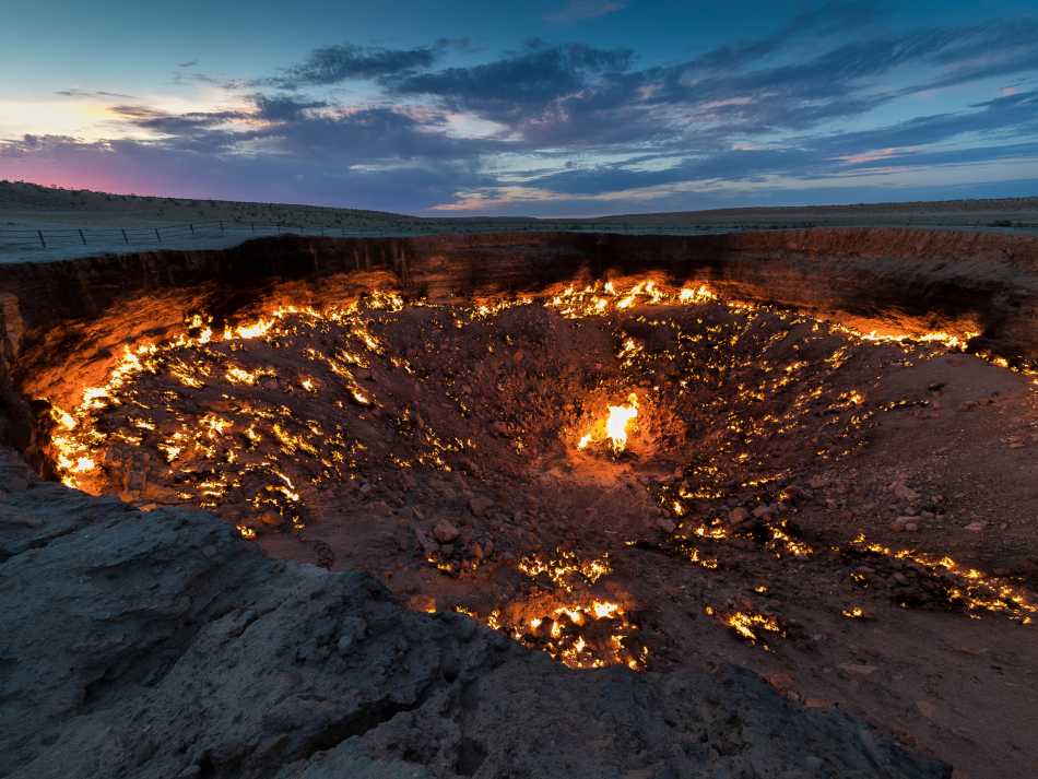 Turkmenistan's Darvaza Gas Crater at sunset | Richard I'Anson