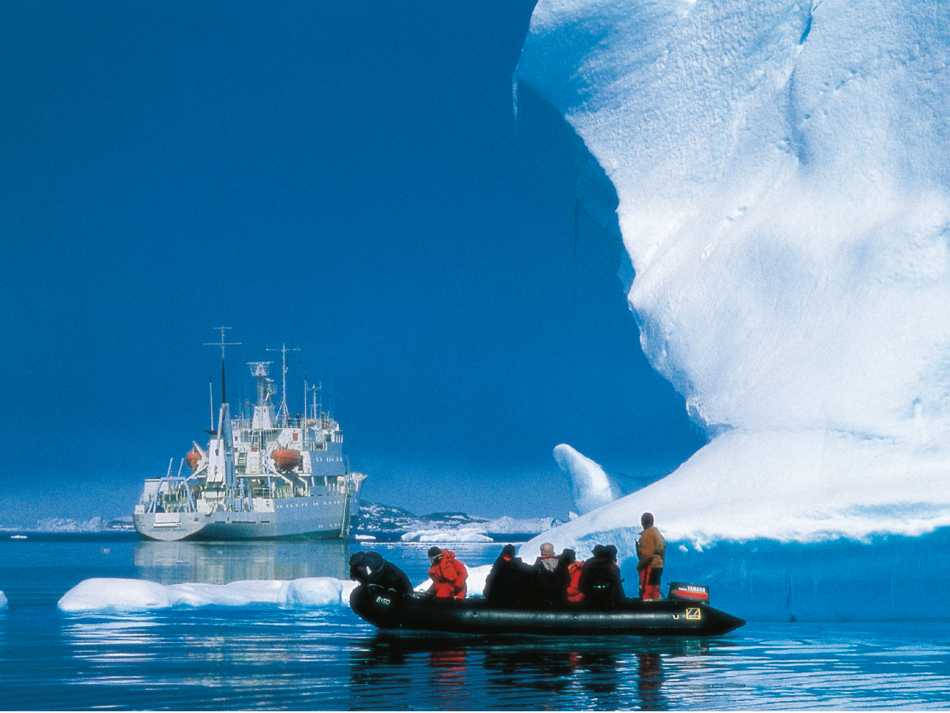 Zodiac excursion among icebergs | Greg Mortimer