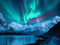The northern lights dance over the skies of Lofoten